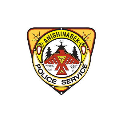 Anishinabek Police Service badge featuring a red eagle symbol, trees, and water.